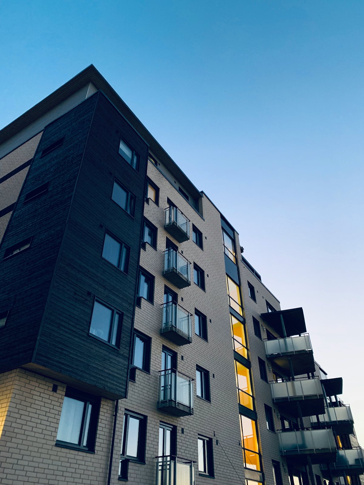 Modern apartment building against a clear sky