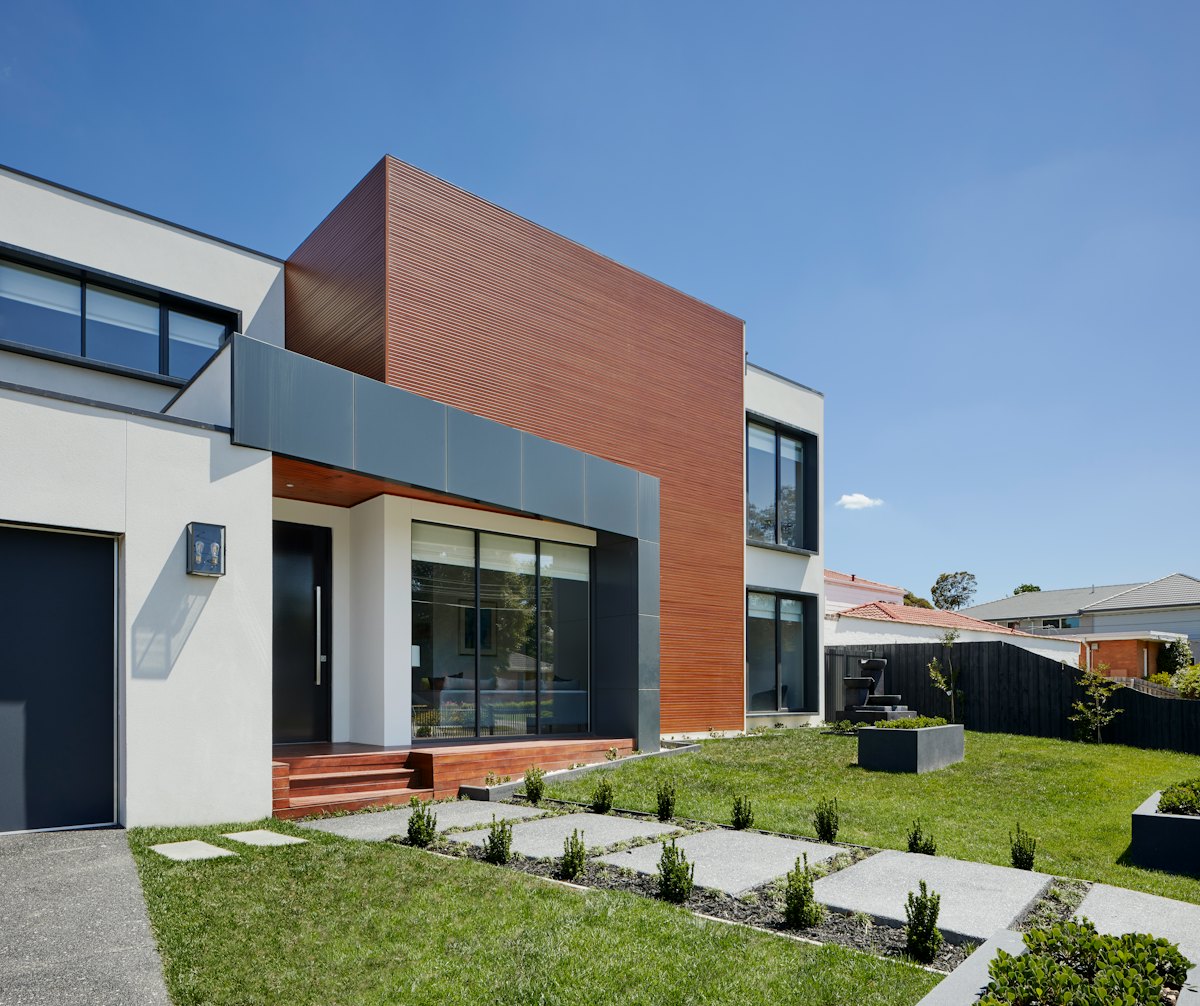 Suburban house with tidy front lawn